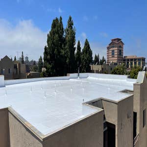 Photos by Peak Builders & Roofers of Orange County #6 American Standard, triple ply system on a commercial building