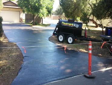 Apshalt Driveway Sealcoat This asphalt was allowed to cure for 1 year prior to sealcoating.