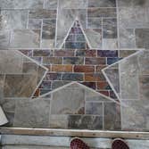 Rowlett, Texas Demo 1000 sq ft of carpet and vinyl plank floor and installation of 1000 sq ft of ceramic tile. Painted interior walls. Design and insta