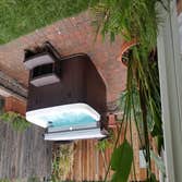Backyard Makeover Here we replaced an old brick surface with interlocking pavers, built planter walls, installed an irrigation system, as well as provi