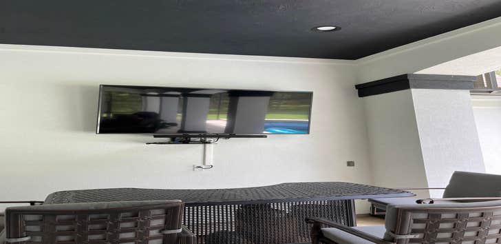 Photos by Spring Woodlands Handyman #1 Paint exterior patio area, install tv mount.