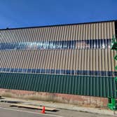 Photos by Nailed It Construction LLC #1 New metal siding on the UFP building in