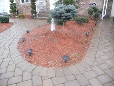 Driveway Extension A large shrub bed in the middle of the driveway needed to be removed to create more parking when the snow covered the streets.