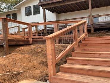 Photos by Barnet Construction #1 Deck and stairs redwood and wild hog fencing