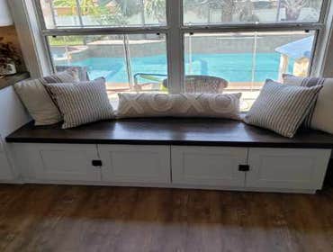 Photos by Jmc Builders Group LLC #1 Complete tear out and remodel with white shaker cabinets , custom oak shelving and bench