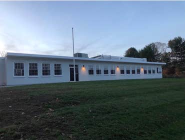 Industrial Exterior Painting – Manufacturing Facility Exterior industrial painting project for a manufacturing facility, including surface preparation 