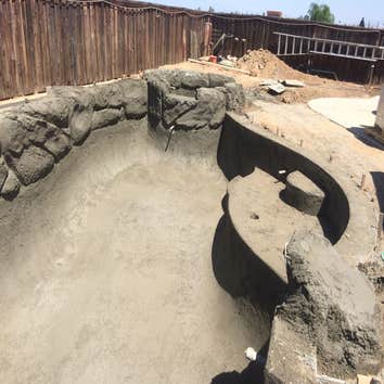 Free Form Pool With Art Rock
