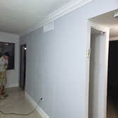 Photos by New Look Design Corp #4 We remove all mod drywall and we install new with texture and paint and we install baseboards and crown molding one p