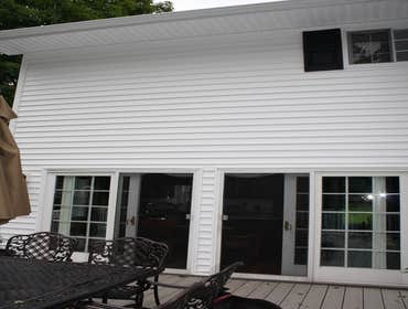 Deck on pool & house, Siding on house, Stairs & Railing