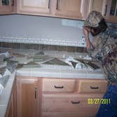 Deans Painting And Home Improvements Project Remodel kitchen counter top and backsplash.