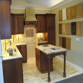 Showroom Photos These displays are in our beautiful showroom in Medfield, MA. They are all wood custom cabinets made to our exacting specifications wi