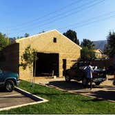 Masonry building with wood frame roof
