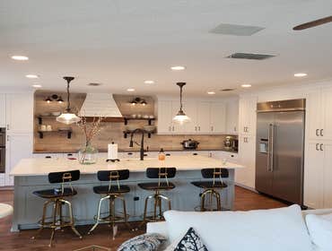 Photos by Jmc Builders Group LLC #1 Complete tear out and remodel with white shaker cabinets , custom oak shelving and bench