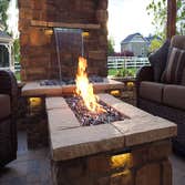 Firepits We all enjoy sitting around a camp fire. You can enjoy this experience year round with a fully installed custom fire pit and outdoor living sp