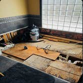 Photos by Gc Contractors #2 Removed old jacuzzi tub that was leaking. fixed leak and floor and added tile and a new standalone tub ordered by customer.