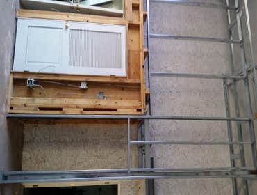 Photo(s) from T And C Drywall This is an apartment main office building.
-Furred out cement walls
-drywall
-texture