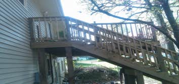 deck rebuild and add on took out old framing,re-framed with new treated lumber, re decked entire deck,built on a new landing and stairs