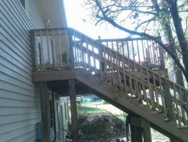 deck rebuild and add on took out old framing,re-framed with new treated lumber, re decked entire deck,built on a new landing and stairs