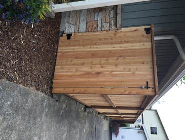 CONTINUOUS FENCE WRAPPING HOUSE CUSTOM HAD US REMOVE OLD CEDAT BOARDS AND ISE EXISTING POSTS, WHICH NEEDED ATTENTION AND TO BE RE-PLUMBED. WAS ASKED TO