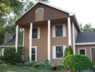 Exterior Painting & Roofing All City Improvements installed a new roof and added a fresh coat of paint to give this Minnesota home a fresh new look