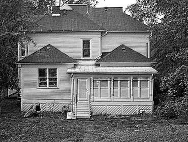 REAR VIEW OF EXISTING HOUSE