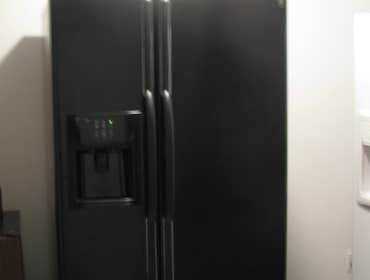 Whirlpool fridge Black side by side fridge that i put together to sell