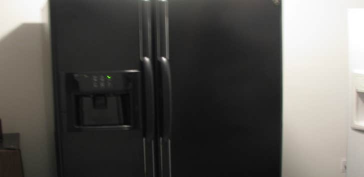 Whirlpool fridge Black side by side fridge that i put together to sell