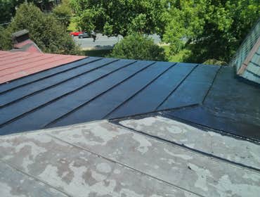 Photo(s) from Jays Roofing And Remodeling Metal seamed roof, destroyed from hail...