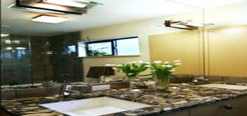Wedgwood Kitchen Blue Sound Construction, Inc. updated this Wedgwood kitchen with some re-framing, all new cabinets, flooring, Calcutta Gold (marble) t