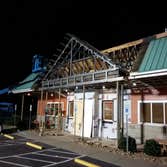 putting on new metal roofing