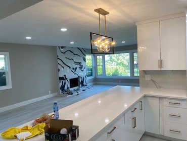Photos by Pan Shi Construction Inc #1 Converted an existing garage into a fully functional Accessory Dwelling Unit (ADU), The project included framing 
