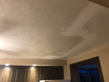 Plaster ceiling repair We patched In the ceiling in a kitchen. Due to a plumbing leak. When it’s painted you’ll never be able to see it.