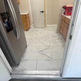 Photos by Fresh Start Renovations LLC #4 Kitchen & Bath Tile Upgrade: Full-Service. This project involved the careful demolition of 100 sq. ft. of old,