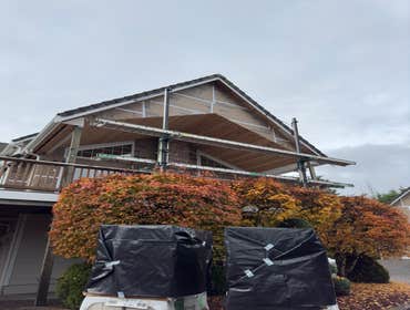 Photos by Ams Siding LLC #2 Full reside of a house and detached garage with color plus James Hardie lap siding and shingles