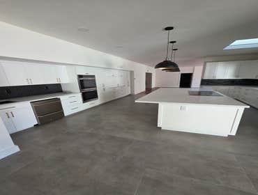 Kitchen Remodeling Kitchen remodel in Paradise Valley including full demolition and haul away of existing cabinets, countertops, and backsplash. Struct