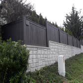 Fence pressure washed and painted