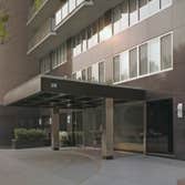 210 Central Park South in New York A mundane beige brick apartment building was transformed into an elegant stone-clad tower with a modern metal and gl