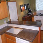 Concrete Countertop Overlay System Concrete overlay that goes right over formica,tile or any other ugly countertops to make it look like a high end sto