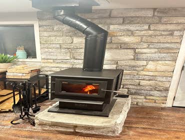 Photos by Lf Air LLC #6 Wood Stove with Stone wall