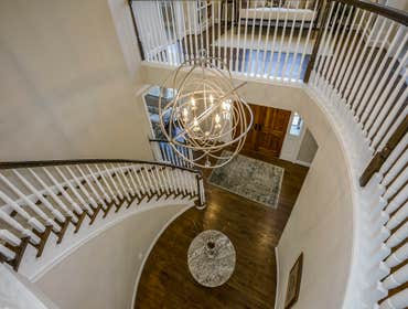 GULICK | CUSTOM Home in McLean The impressive stone and HardiePlank® elevation on our Winthrop really stood out on this corner lot of approximately one