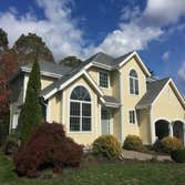 Niantic Estate The customer of this beautiful estate chose to replace three windows, including the two arched windows in the picture, with Marvin Windo