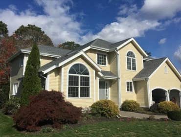 Niantic Estate The customer of this beautiful estate chose to replace three windows, including the two arched windows in the picture, with Marvin Windo