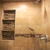 Fiskum Flooring & Custom Showers logo