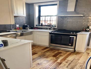 DC Apartment Project We installed J&K S8 White Shaker cabinets and Steel Gray Leather granite counter-tops.