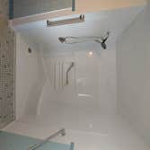 Photos by His & Her Construction #1 Remove a bathtub and install a stand up shower.