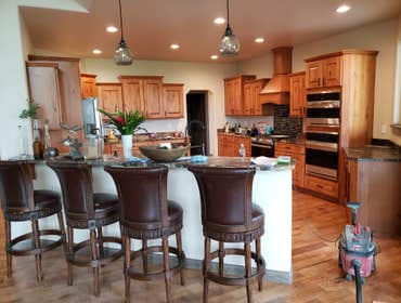 Photos by North Country Construction Inc #1 We built this gorgeous 5,000 SF house for a client in the powderhorn. It has a attached 3 car garage on a n