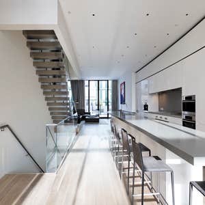 TRIBECA TRIPLEX PENTHOUSE RENOVATION Renovation of three floor loft space with new staircases, kitchen, living quarters, bathrooms and rooftop...