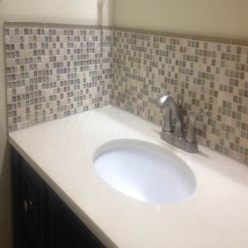 Bathroom backsplash (10/2012) Glass/stone backsplash for bathroom vanity.
Adding a tile backsplash can be an great way to add some of your personality