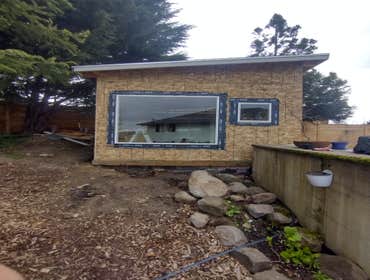 Photos by Stewart & Son Gate & Fence LLC #1 Tiny House with pergola. Small house 17' by 12' small bathroom with pocket door, and small sink with water 