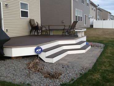 Photos by Custom Home Specialties Inc #2 Timber Tech maintenance free decks with powder coated railings.